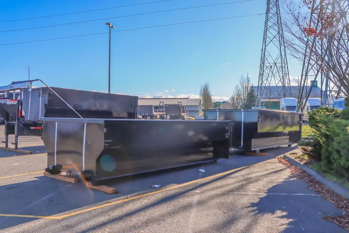 Roll-off dumpster ready for waste disposal at job site for Roll Off Dumpster Rental in Quincy